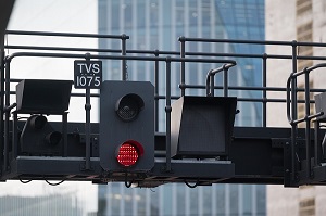 An image of a set of railway signals with a red light