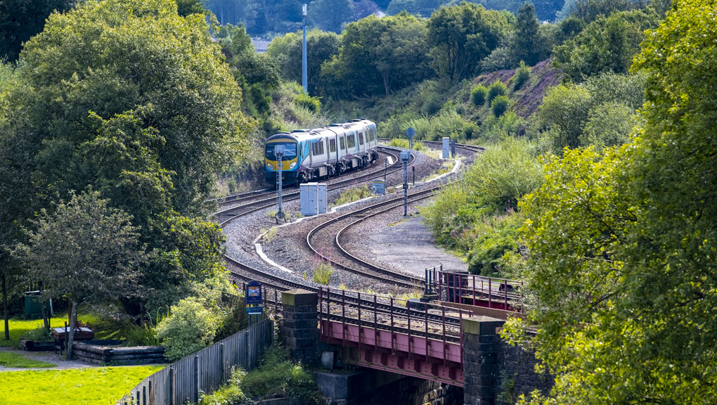 Photo of a train travelling through countryside